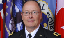 http://cdn.arstechnica.net/wp-content/uploads/2013/12/General_Keith_B._Alexander_in_service_uniform-640x800.jpg