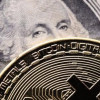 http://thehill.com/sites/default/files/styles/thumb_small_article/public/bitcoin_dollar_1.jpg?itok=ZPKQ1Yn-